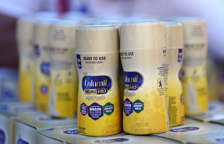 Infant formula is stacked on a table during a baby formula drive to help with the shortage Saturday, May 14, 2022, in Houston. Parents seeking baby formula are running into bare supermarket and pharmacy shelves in part because of ongoing supply disruptions and a recent safety recall. (AP Photo/David J. Phillip) TXDP105 TXDP105