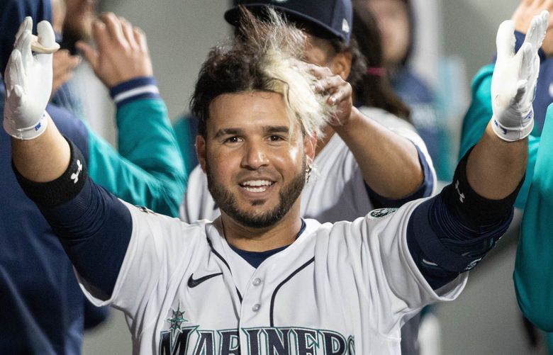 ­Eugenio Suarez celebrates his 2-run homer in the 8th, his hair messed up by pitcher Yohan Ramirez.

The Houston Astros played the Seattle Mariners in the home opener for Seattle Friday, April 15, 2022 at T-Mobile Park, in Seattle, WA. 220128
