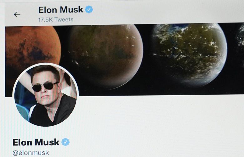 FILE – Part of the Twitter page of Elon Musk is seen on the screen of a computer in Sausalito, Calif., on Monday, April 25, 2022. The Tesla CEO gave the strongest hint yet Monday, May 16, 2022, that he would like to pay less for Twitter than his $44 billion offer made the previous month. (AP Photo/Eric Risberg, File) NY729 NY729