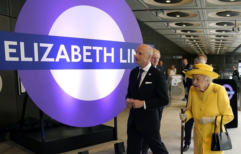 Britain’s Queen Elizabeth II and Prince Edward, right, talks with Transport for London commissioner Andy Byford, left, at Paddington station in London meets staff of the Crossrail project, as well as Elizabeth Line staff who will be running the railway, to mark the completion of London’s Crossrail project, Tuesday, May 17, 2022. (Andrew Matthews/Pool via AP) LBJ119 LBJ119