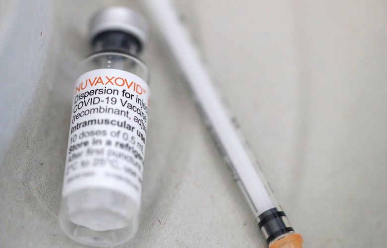 Illustration picture shows Nuvaxovid vial pictured during the start of vaccination with the Nuvaxovid vaccine, at the Pacheco test and vaccination centre in Brussels on March 3, 2022. (Nicolas Maeterlinck/Belga/AFP/Getty Images/TNS) 48139126W 48139126W