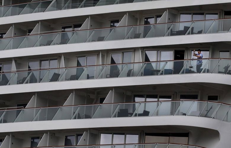 A worker aboard the Norwegian Bliss at Pier 66 cleans balcony panels before the ship’s departure for Alaska.
The cruise ship is 1,094-feet long with a capacity for more than 4,000 passengers and a crew of more than 1,700.
It was built in 2018. This ship will depart every Saturday
Into September with almost 300 sailings.
LO Linesonly. Saturday May 2, 2022 220326