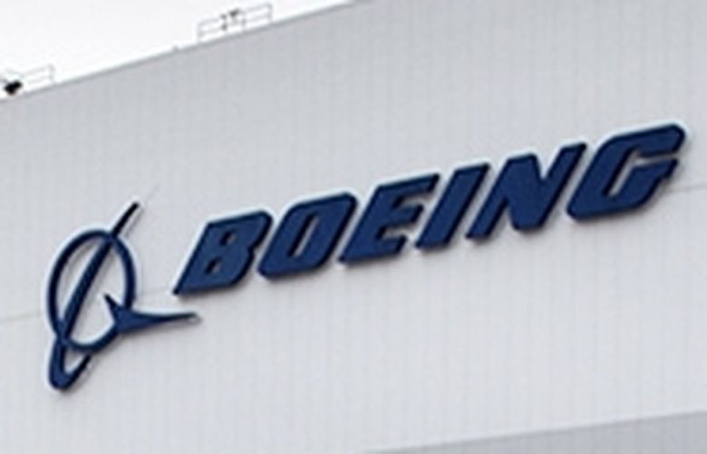A car streams past Boeing’s Advanced Developmental Composites facility on East Marginal Way S. In Seattle Tuesday, January 5, 2020. This massive, windowless box-like building, the Boeing 9-101 Building, has housed many secretive developmental and research projects. It was here Boeing perfected the manufacturing methods used to fabricate large parts of the B-2 Stealth bomber in the early 1990s and the wings of the 787 in the 2000s. Boeing is planning to close this manufacturing research and development center.
216055