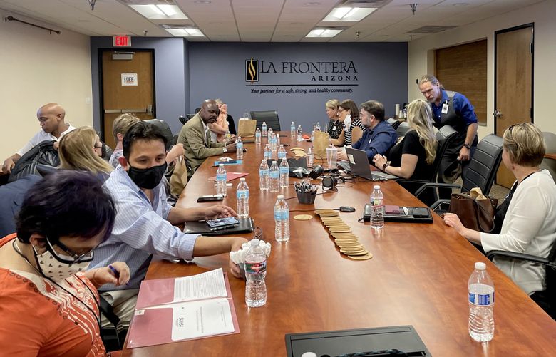 In May, a Washington delegation of state and county leaders, state agency staff and advocates flew to Maricopa County to learn more about the Arizona crisis model. (Esmy Jimenez / The Seattle Times)