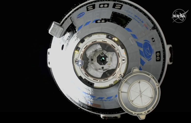 This image from NASA TV shows the Boeing Starliner approaching the International Space Station, Friday, May 20, 2022. Boeing’s astronaut capsule has arrived at the International Space Station in a critical repeat test flight. Only a test dummy was aboard the capsule for Friday’s docking, a huge achievement for Boeing after years of false starts. (NASA via AP) NYMV103 NYMV103