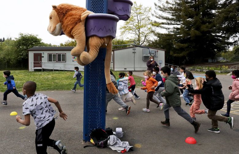 John Muir Elementary first-graders dash around the playground doing 24 laps at Move-A-Thon. The lion is the mascot for the school.
Ref to more photos online.
It’s an event hosted by the PTA’s in Seattle Public Schools to raise money for schools in the southeast part of the district. The students will be running laps in the playground.
Friday May 13, 2022 220397