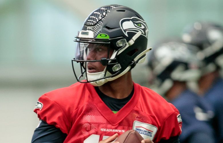Seattle Seahawks quarterback Levi Lewis (15) practices at the team’s headquarters in Renton, Wash. Friday, May 6, 2022. 220314