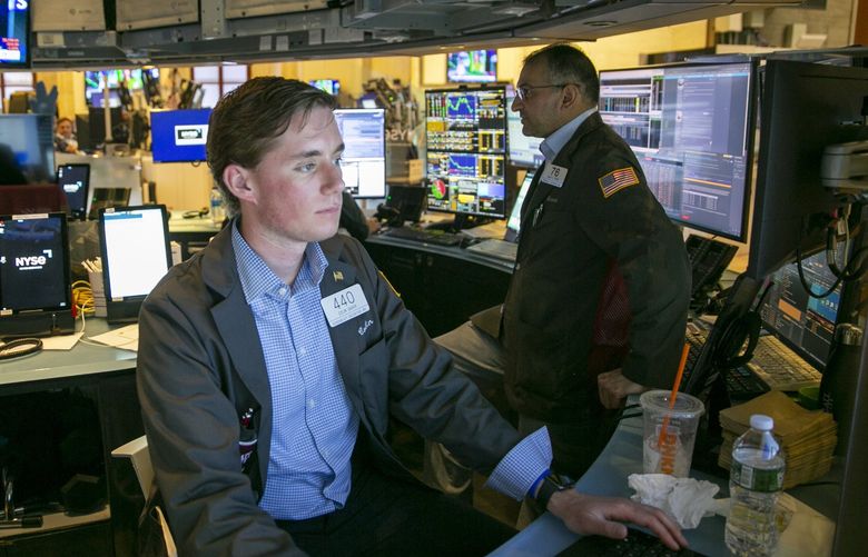Traders work on the New York Stock Exchange floor in New York City on Friday, May 20, 2022. (AP Photo/Ted Shaffrey)