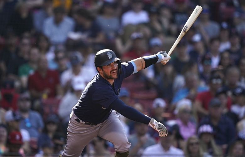 Seattle Mariners’ Luis Torrens gets an RBI-hit in the third inning of a baseball game against the Boston Red Sox, Saturday, May 21, 2022, in Boston. (AP Photo/Robert F. Bukaty) MARB107 MARB107