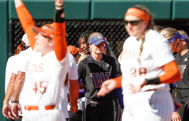 Husky Softball Stadium – NCAA regionals – University of Washington Huskies vs. University of Texas – 052122

Texas players celebrate the 8-2 over Washington as the teams shake hands at the end of the game Saturday, May 21, 2022, in Seattle, Wash. 220443