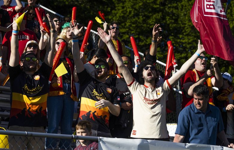 Ballard FC fans cheer during for their team at Interbay Stadium on May 21, 2022.