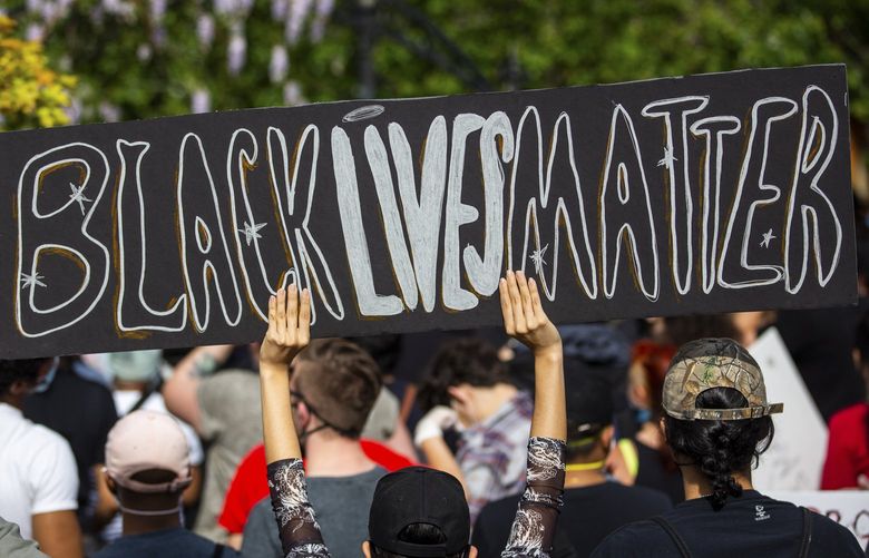 FILE — Protesters during a Black Lives Matter protest in Manhattan following the death of George Floyd, June 2, 2020. An appeals court on May 19, 2022, reinstated a New York City law forbidding police officers from compressing a suspect’s diaphragm, the latest turn in a protracted legal struggle over the measure passed two years ago. (Demetrius Freeman/The New York Times) XNYT138 XNYT138