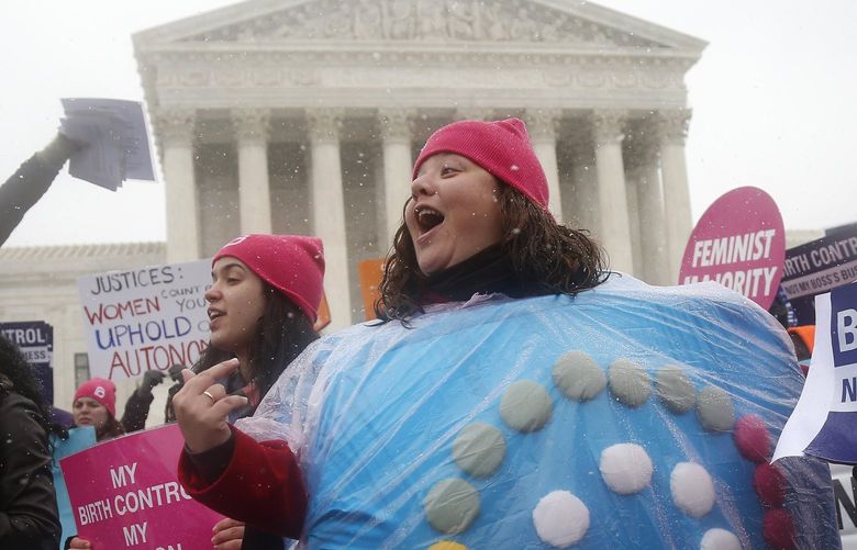 FILE – Margot Riphagen of New Orleans, wears a birth control pill costume as she protests in front of the Supreme Court in Washington on March 25, 2014. In 2022, a leaked draft opinion indicating U.S. Supreme Court justices are poised to overturn the decision that legalized abortion nationwide in the U.S. is raising fears that restrictions on contraception could follow. (AP Photo/Charles Dharapak, File) CER601 CER601