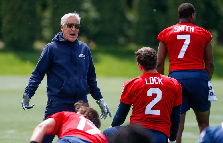 VMAC – Seattle Seahawks OTAs – Day one – 052322

Head coach Pete Carroll chats with quarterback Drew Lock during OTAs Monday, May 23, 2022, in Renton, Wash. 220449