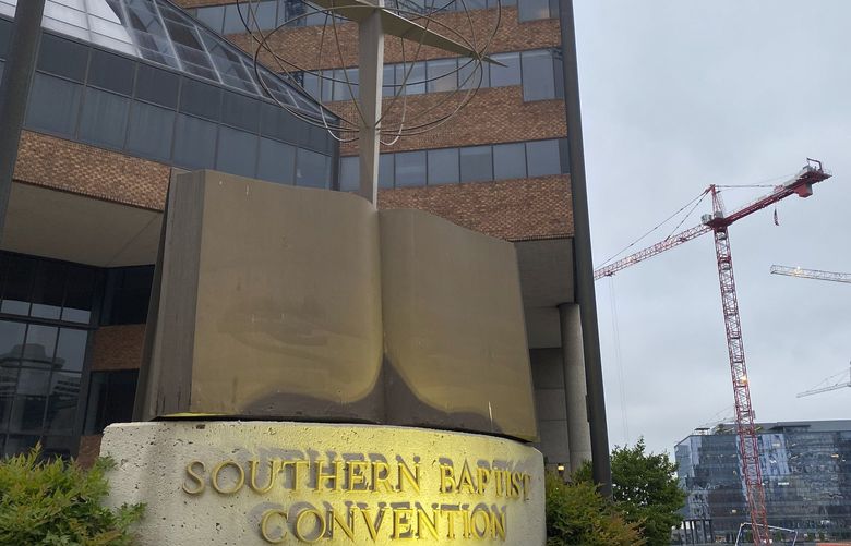A cross and Bible sculpture stand outside the Southern Baptist Convention headquarters in Nashville, Tenn., on Tuesday, May 24, 2022. On Tuesday, top administrative leaders for the SBC, the largest Protestant denomination in America, said that they will release a secret list of hundreds of pastors and other church-affiliated personnel accused of sexual abuse. (AP Photo/Holly Meyer) RPHM101 RPHM101
