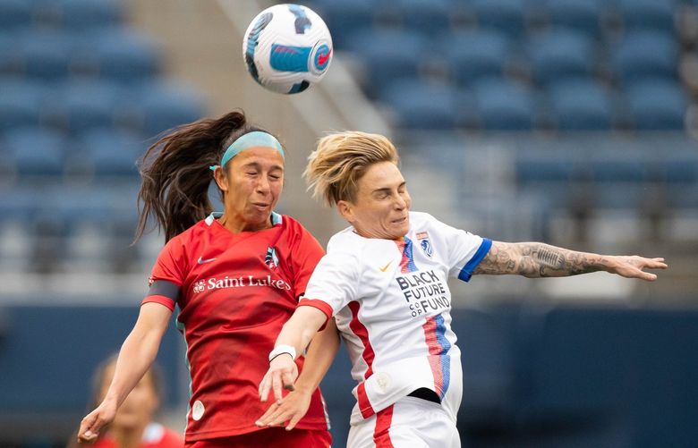 Seattle’s Jess Fishlock does battle with Kansas City’s Victoria Pickett on the header in the first half of play.

The Kansas City Current played the OL Reign in NWSL action Wednesday, May 25, 2022 from Lumen Field in Seattle, WA. 220487