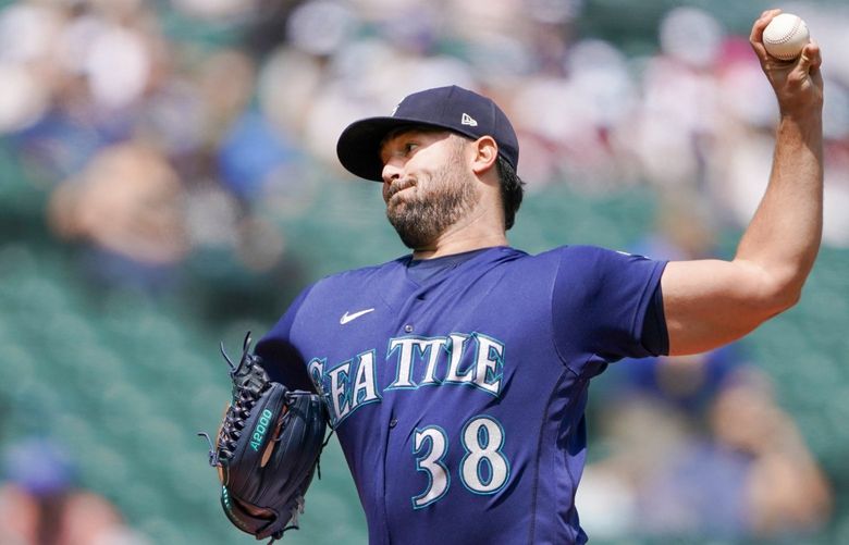 Seattle Mariners starting pitcher Robbie Ray throws against the Oakland Athletics during the first inning of a baseball game, Wednesday, May 25, 2022, in Seattle. (AP Photo/Ted S. Warren) WATW104