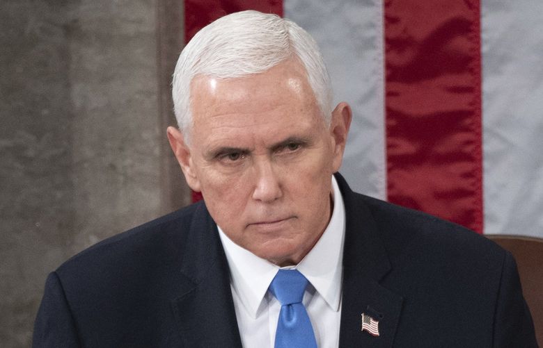 FILE – Vice President Mike Pence presides over a joint session of Congress as it convenes to count the Electoral College votes cast in November’s election, at the Capitol in Washington, Jan. 6, 2021. The House committee investigating the Jan. 6 insurrection has interviewed nearly 1,000 people. But the nine-member panel has yet to talk to the two most prominent players in that day’s events – former President Donald Trump and former Vice President Mike Pence. (Saul Loeb/Pool via AP, File) WX205 WX205