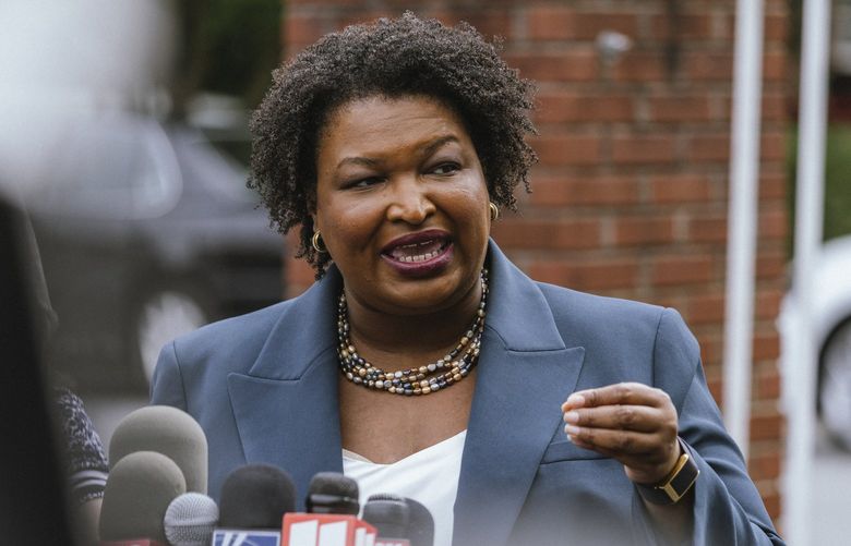 Stacey Abrams, the Democratic gubernatorial candidate, speaks to reporters on Primary day in Atlanta, May 24, 2022. Even as they fought among themselves in vigorous primary battles, Abrams has featured prominently in GOP ads and debates as a symbol of the threat of Democratic ascendance in Georgia. (Audra Melton/The New York Times)



 XNYT160 XNYT160