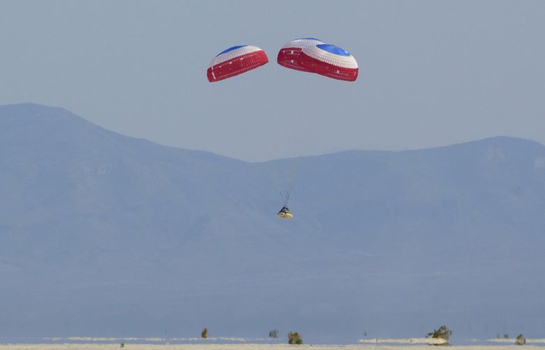 Boeing’s CST-100 Starliner spacecraft lands at White Sands Missile Range’s Space Harbor, Wednesday, May 25, 2022, in New Mexico. (Bill Ingalls/NASA via AP) NYPH400 NYPH400
