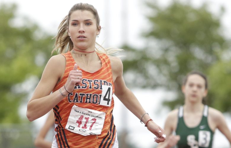 Eastside Catholic’s Kate Jendrezak takes an early lead in the 4A 800-meter run during WIAA state track and field championships at Mt. Tahoma High School in Tacoma, Wash., Saturday, May 25, 2019.