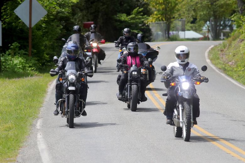A group of motorcyclists head out onto Highway 101 on the west side of Hood Canal. (Greg Gilbert / The Seattle Times)