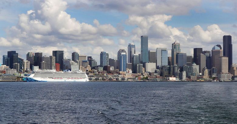 The Norwegian Bliss cruise ship docks on the downtown Seattle waterfront after completing its first trip of the season to Alaska in late April. (Greg Gilbert / The Seattle Times)