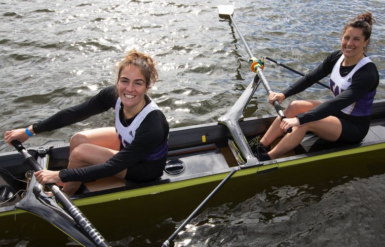 University of Washington women’s crew rowers Carmela Pappalardo, left, and Valentina Iseppi, both seniors, Thursday, May 19, 2022 at UW in Seattle. Both headed to the NCAA Championships on May 28. UW won last year and is looking to defend their crown.