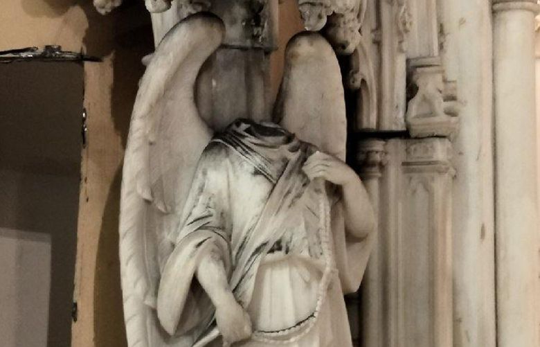 Someone got inside a New York City church and severed a head on an angel statue. (DeSales Media Group/Diocese of Brooklyn/TNS) 49171350W 49171350W