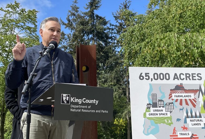 King County Executive Dow Constantine, at a White Center park on Thursday, wants to increase property taxes to preserve 65,000 acres of trails, forest, rivers and natural lands. (David Gutman / The Seattle Times)