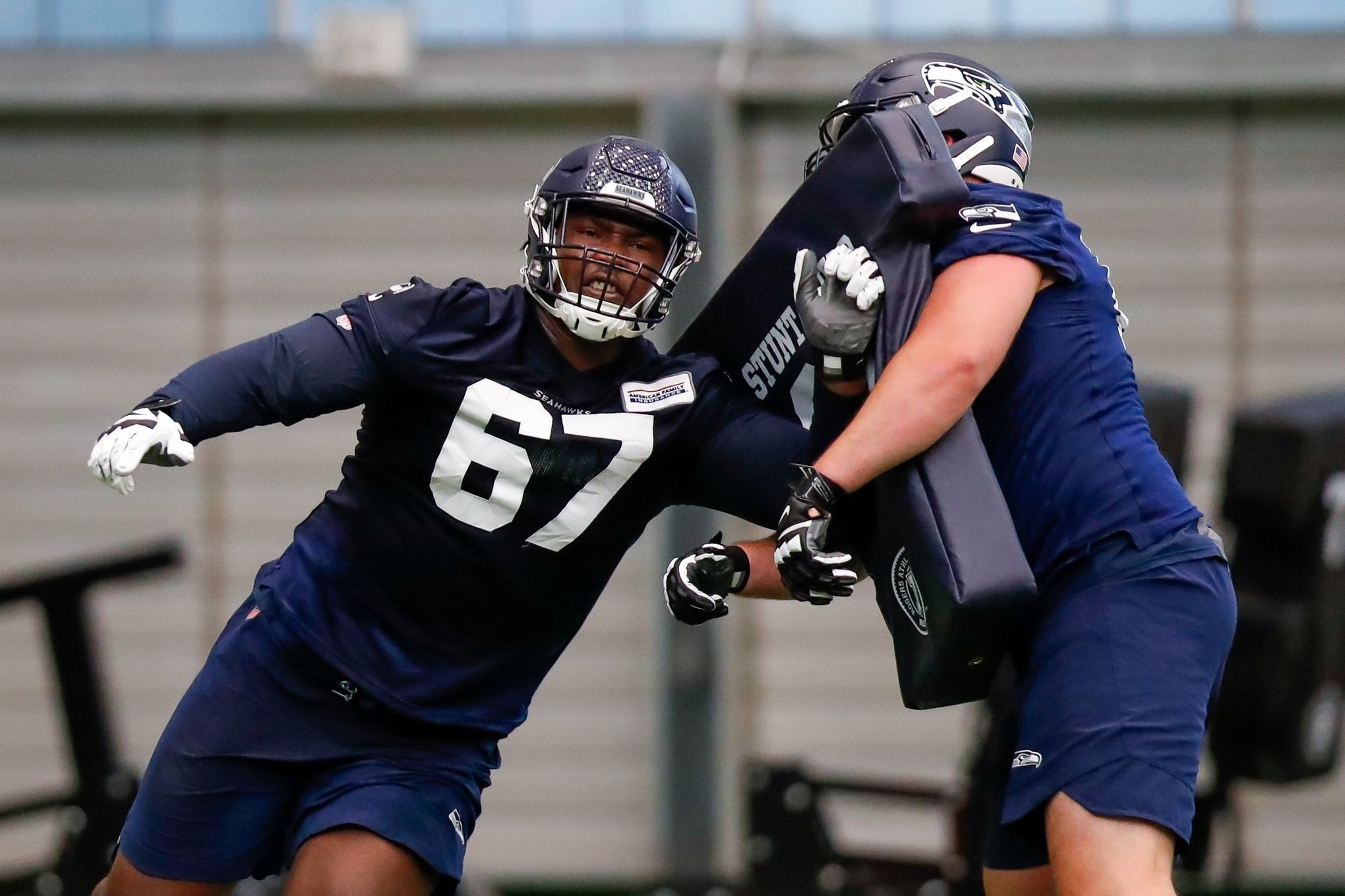 Rookies Cross, Lucas passing early tests on Seahawks O-line