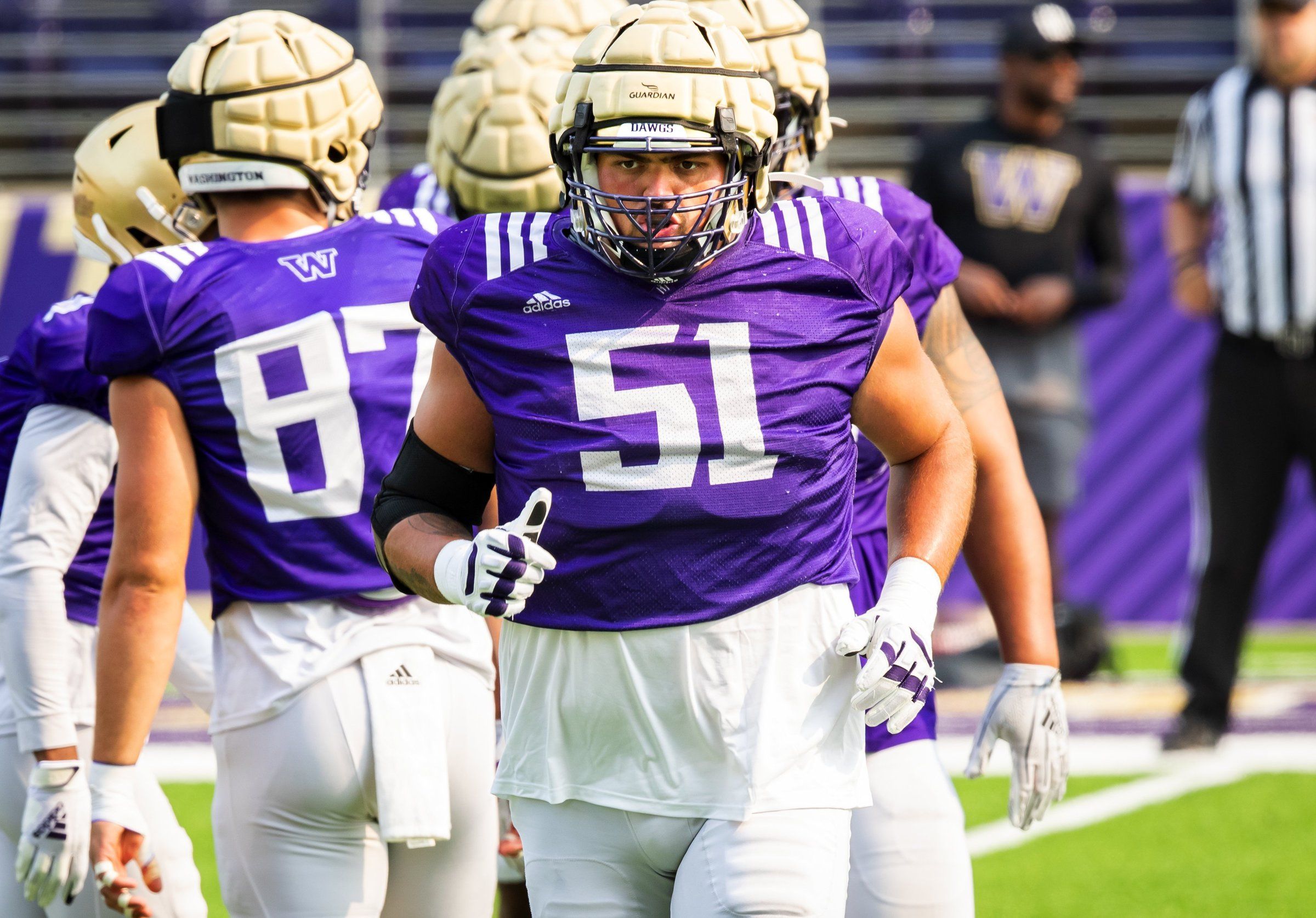 Husky Nation: I'm back.' All-Pac-12 left tackle Jaxson Kirkland