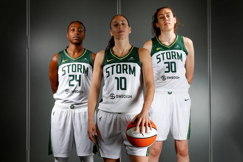 Seattle Storm players Jewell Loyd, Sue Bird and Breanna Stewart posse for a portrait Sunday, April 24, in Seattle, Wash. (Jennifer Buchanan / The Seattle Times)
