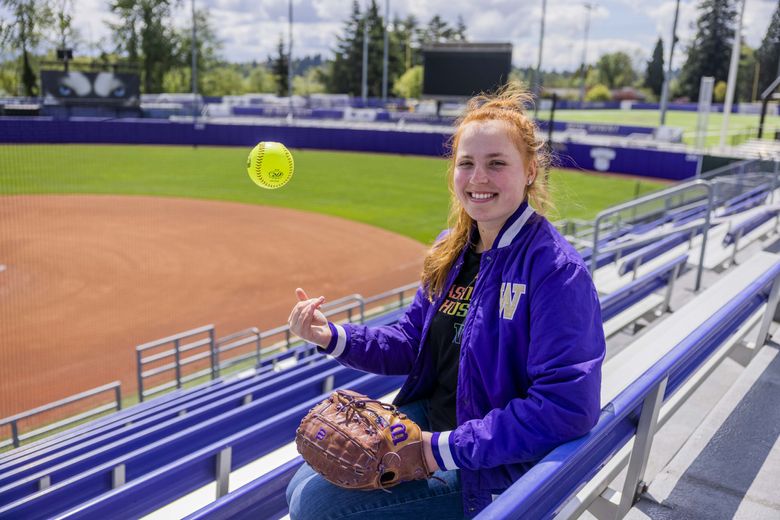 Gabbie Plain at Husky Softball Stadium at the University of Washington in Seattle on May 10, 2022. Plain is a pitcher for the softball team at UW and is a 2020 Olympian.  (Daniel Kim / The Seattle Times)
