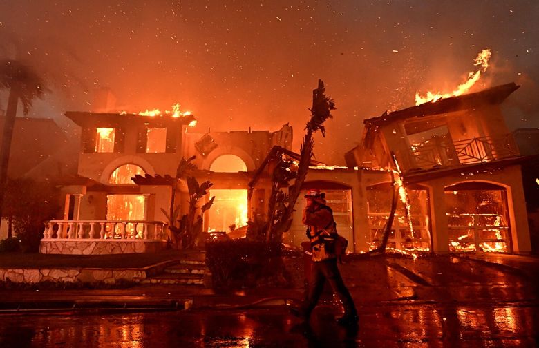 Laguna Niguel, California May 11, 2022- Firefighters battle a brush fire at Coronado Pointe in Laguna Niguel Wednesday.