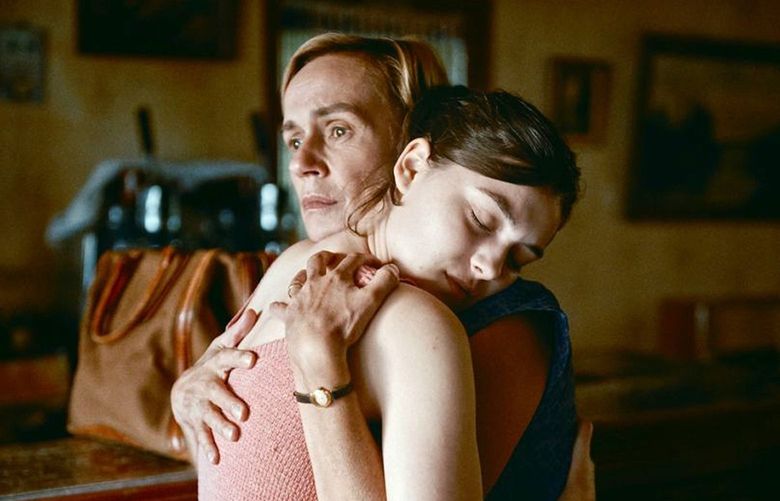 This image released by IFC Films shows Anamaria Vartolomei, left, and Sandrine Bonnaire in a scene from “Happening.” (IFC Films via The Associated Press)