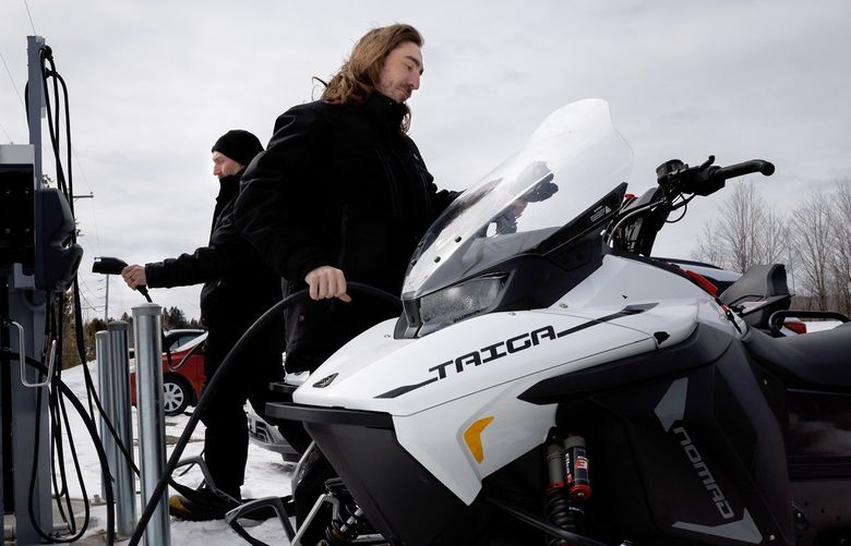 FILE — Battery-powered snowmobiles produced by Taiga Motors at a charging port in Saint-Paulin, Quebec, Canada, on March 29, 2022. While electric cars get most of the attention, electric lawn mowers, boats, bicycles, scooters and all-terrain vehicles are proliferating. (Nasuna Stuart-Ulin/The New York Times)
XNYT47 XNYT47