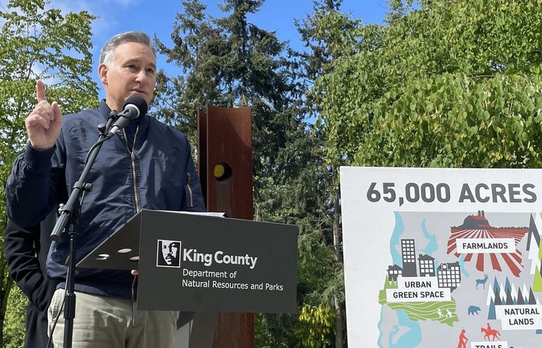 King County Executive Dow Constantine, at a park in White Center, announced a proposal Thursday to increase property taxes to preserve 65,000 acres of trails, forest, rivers and natural lands.