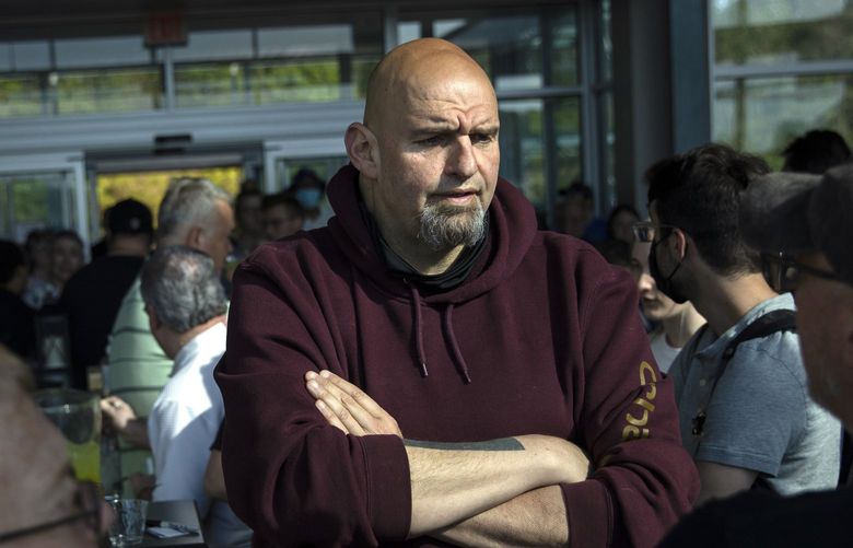 Pennsylvania Lieutenant Governor John Fetterman speaks with supporters while campaigning for the U.S. Senate in Lemont Furnace, Pa., on Tuesday, May 10, 2022. Fetterman’s outsider image has resonated with the Democratic base. (Maddie McGarvey/The New York Times)