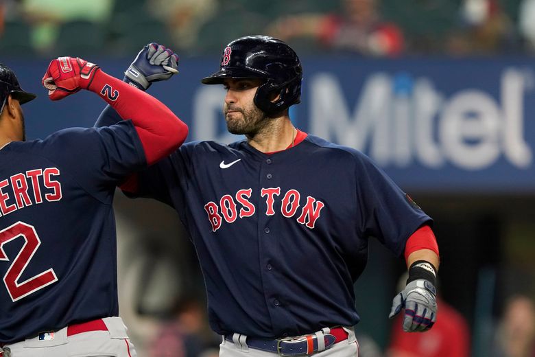 Boston Red Sox third baseman Rafael Devers celebrates his solo HR