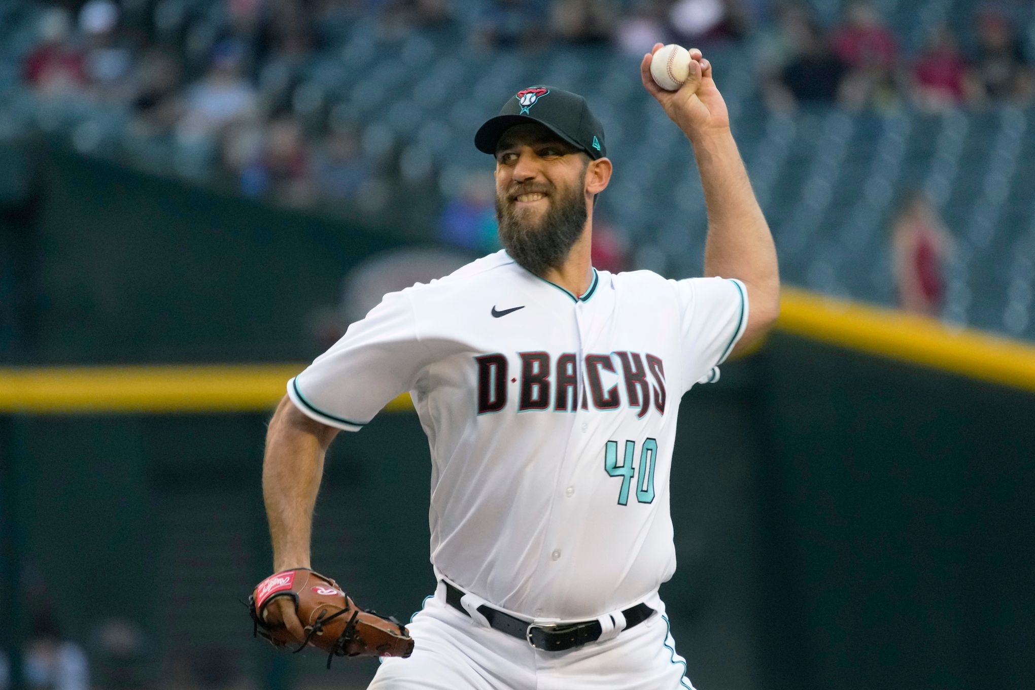 Diamondbacks place Madison Bumgarner on injured list with mid-back