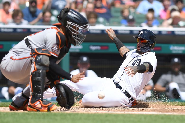 Baltimore Orioles' Jorge Mateo slides safely into home to score