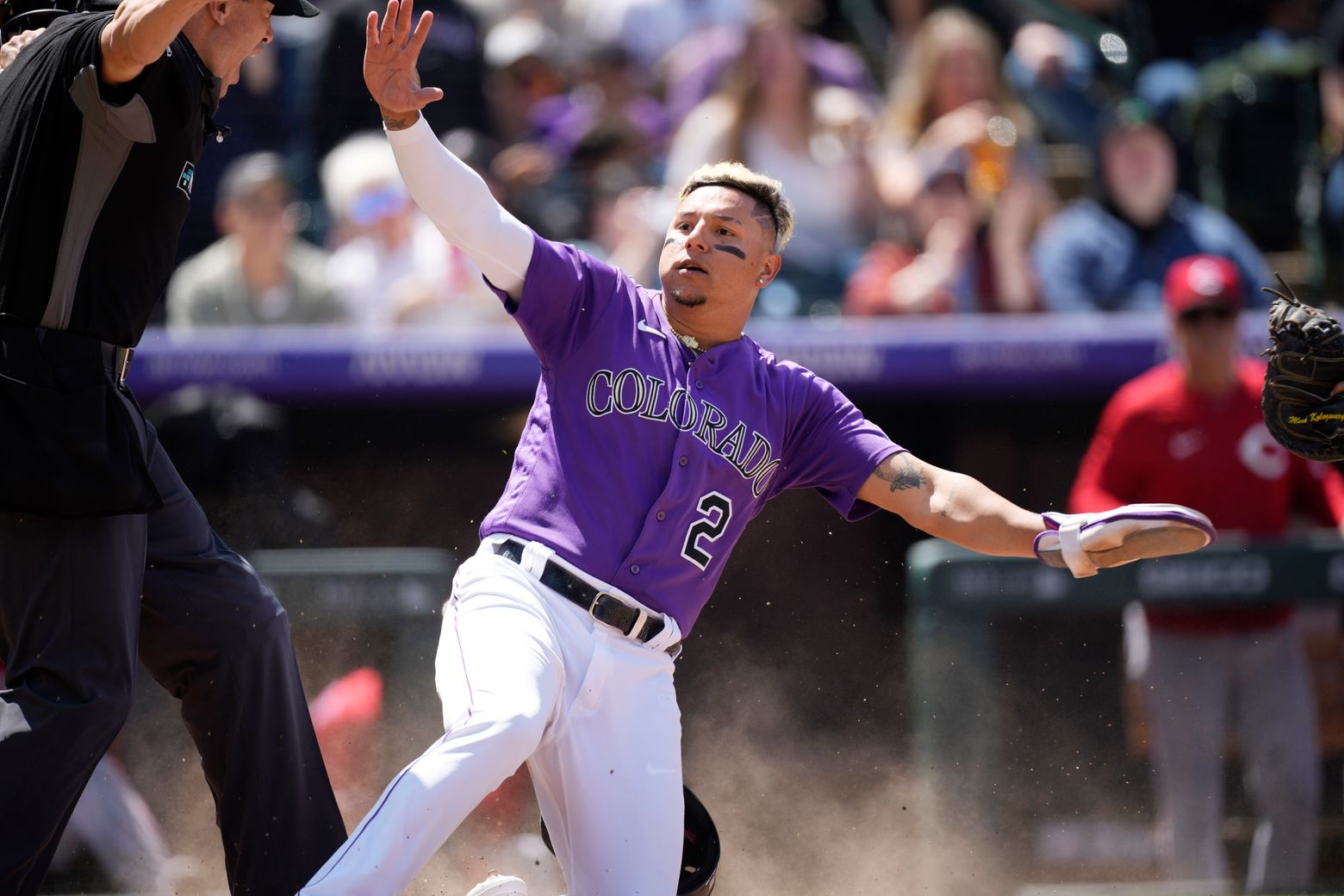 Freeland tosses 7 solid innings, Rockies beat Reds, 10-1