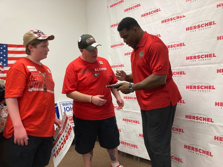 Herschel Walker's ties to veterans program face scrutiny