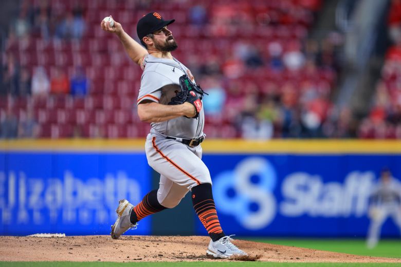 Cincinnati Reds starting pitcher Graham Ashcraft throws against