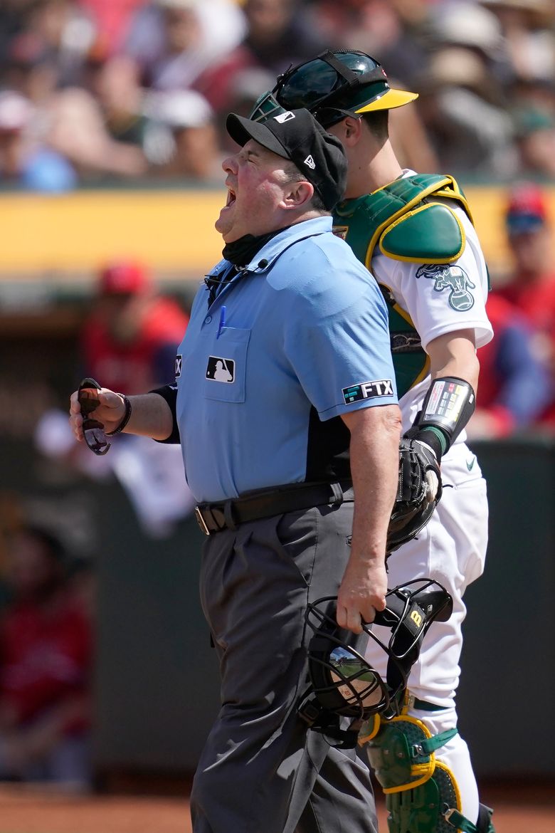 Plate ump leaves A's-Angels game after getting hit twice