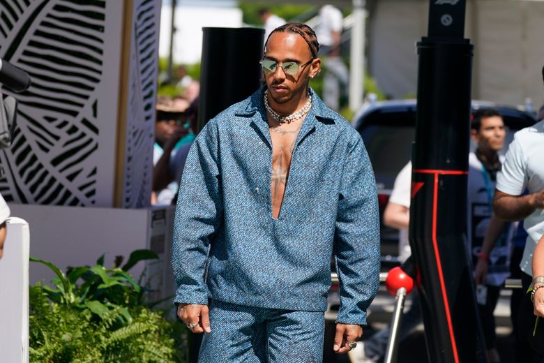 Lewis Hamilton pictured outside of his pop-up at Alchemist, wearing head-to-toe  Louis Vuitton. Hamilton stopped by the District Sunday…