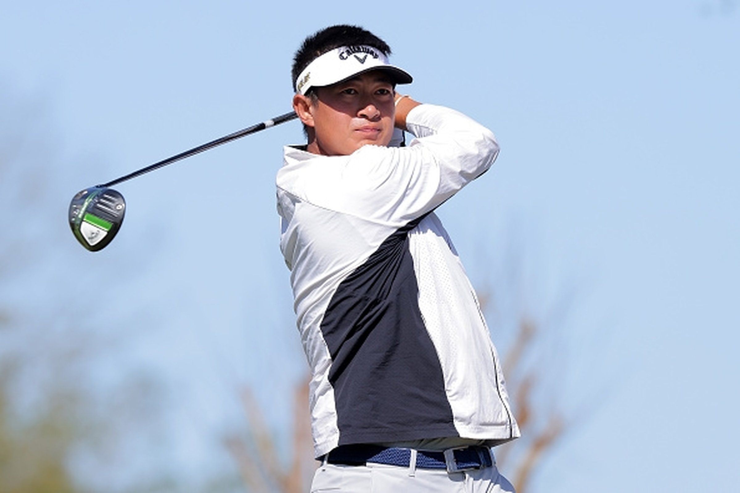 Former UW Husky Carl Yuan has PGA Tour card waiting, but wants to finish No