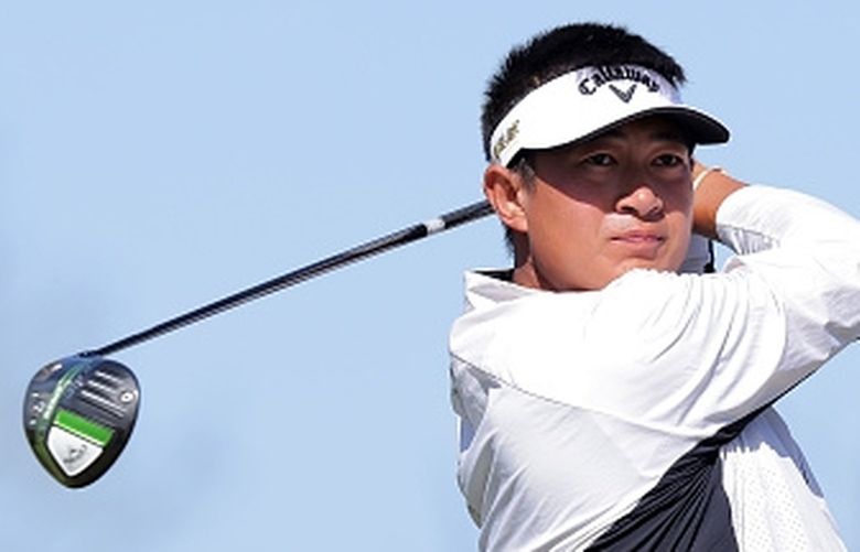 Carl Yuan of China hits a tee shot on the second hole during the second round of the Lake Charles Championship at Country Club at Golden Nugget on March 25, 2022 in Lake Charles, Louisiana. Former Washington Husky golfer Carl Yuan is the No. 1 player on the Korn Ferry Tour this season and has secured a PGA Tour card for next season.(Photo by Jonathan Bachman/Getty Images via Korn Ferry Tour)