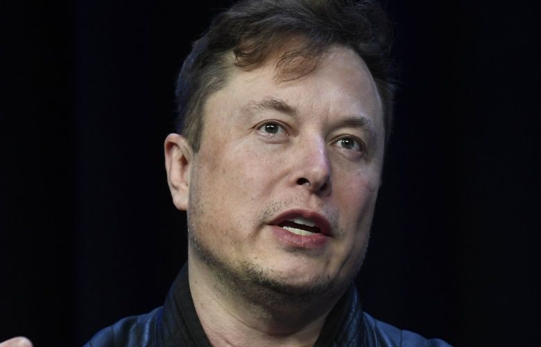 FILE – Tesla and SpaceX Chief Executive Officer Elon Musk speaks at the SATELLITE Conference and Exhibition in Washington, on March 9, 2020. Tesla shares tumbled more than 7% in early trading on Friday, June 3, 2022, on a report that Musk is considering laying off 10% of the electric automakersâ€™ workers.  (AP Photo/Susan Walsh, File) NYDD210 NYDD210